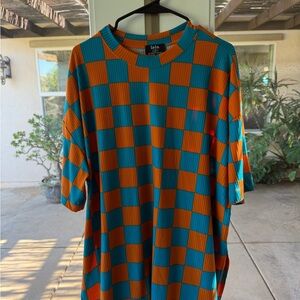 Dressed in LALA Orange and Teal Checkered Top